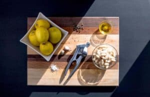 white bean dip ingredients on a wooden board