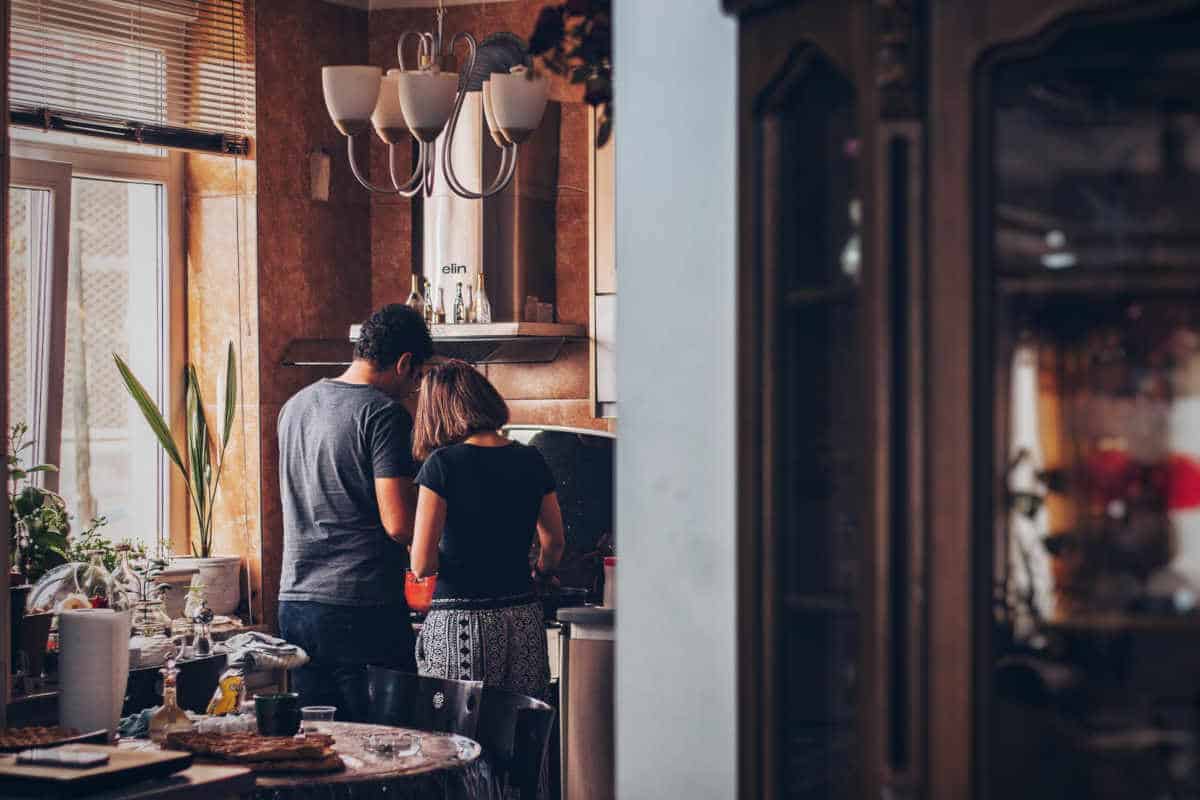 standing in the kitchen together