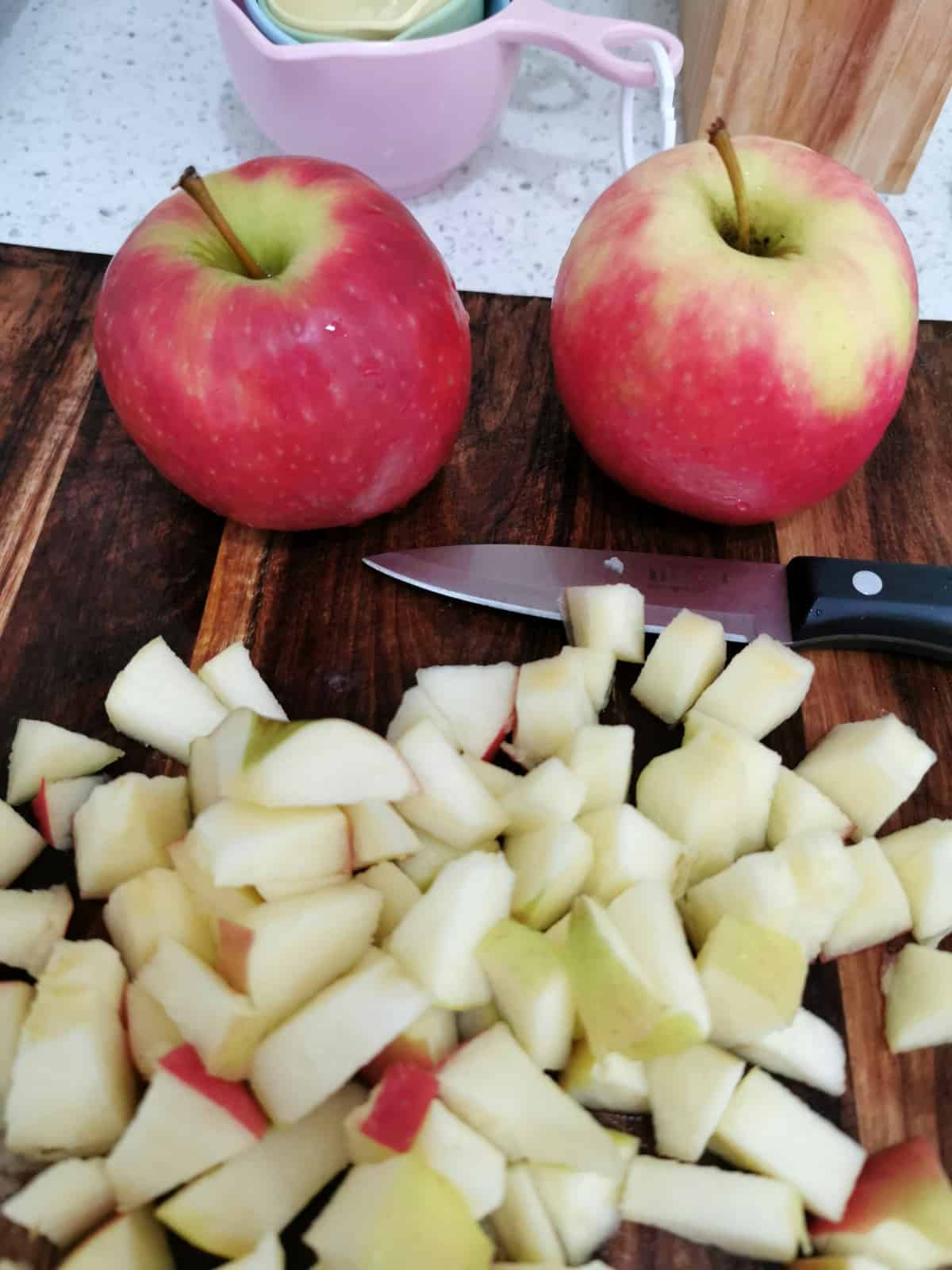 Apples diced on cutting board
