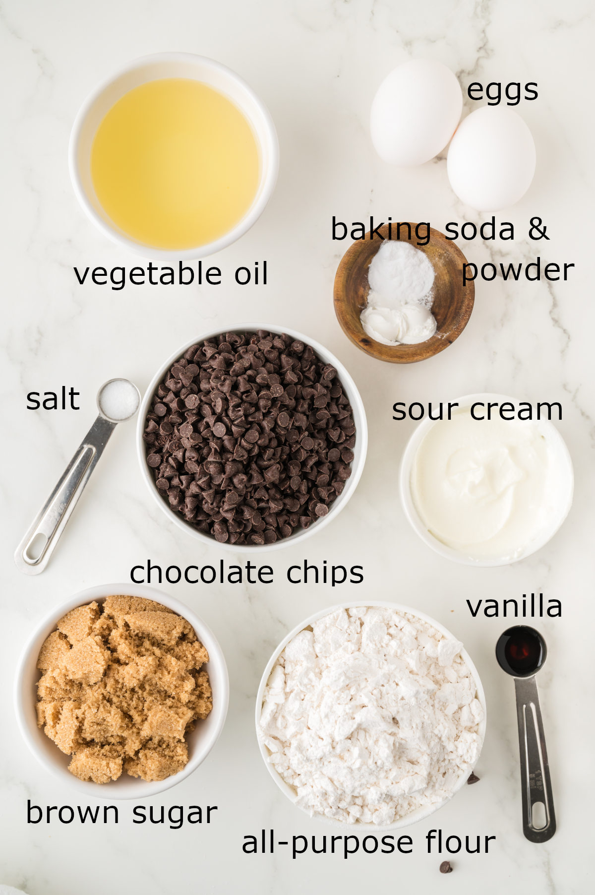 Ingredients for the cake laid out on a white counter.