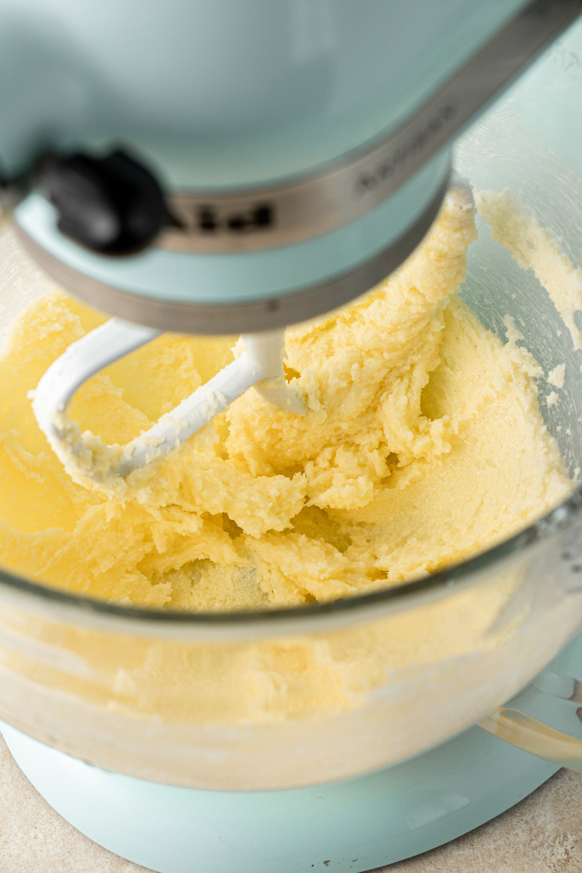 Creamed butter and sugar in the bowl of a stand mixer.